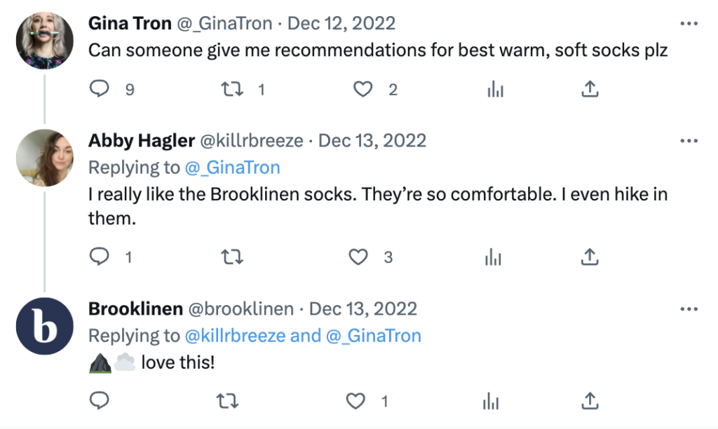 A conversation on Twitter where someone asks for recommendations for the best warm, soft socks. A commenter mentions Brooklinen, without tagging them, and Brooklinen responds to the thread.